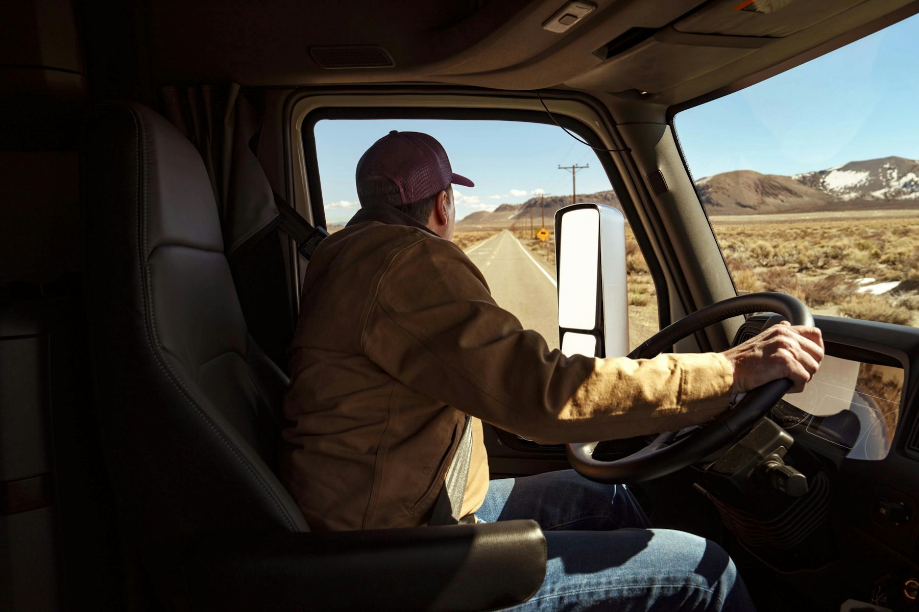 Driver at the wheel of an International truck